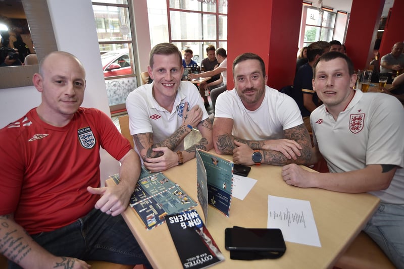 England fans watching the Euro 20 semi-final at the Coyotes Bar and Grill at New Road, Peterborough EMN-210707-230906009