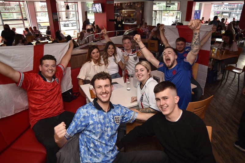 England fans watching the Euro 20 semi-final at the Coyotes Bar and Grill at New Road, Peterborough EMN-210707-230917009