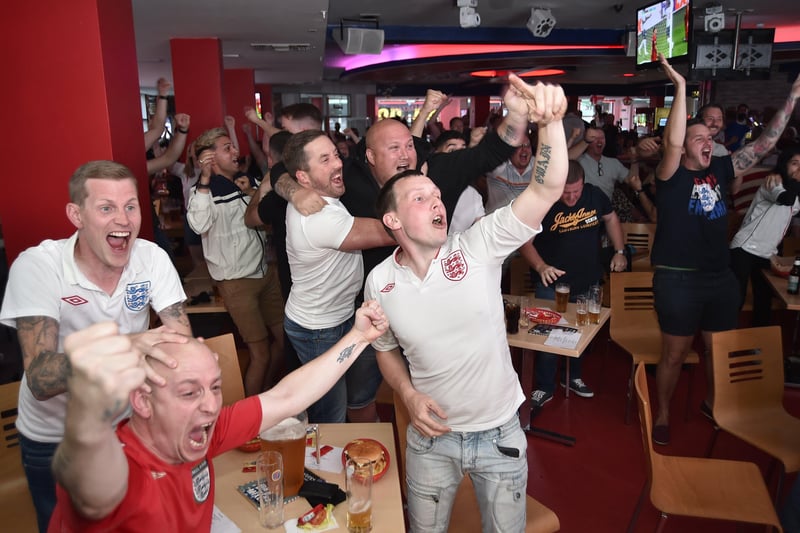 England fans watching the Euro 20 semi-final at the Coyotes Bar and Grill at New Road, Peterborough EMN-210707-231012009