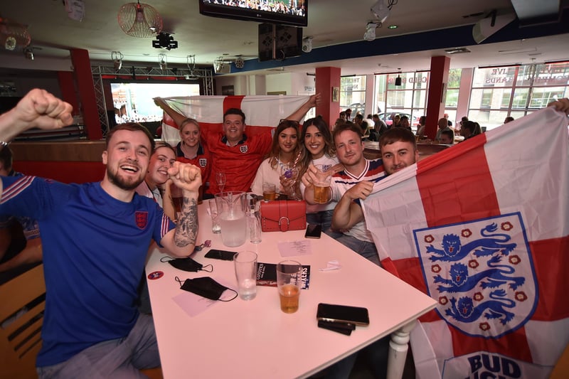 England fans watching the Euro 20 semi-final at the Coyotes Bar and Grill at New Road, Peterborough EMN-210707-230928009
