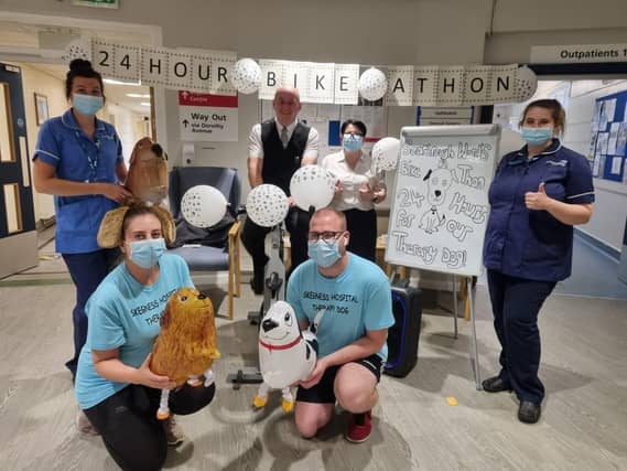 Hospital staff who took part in the 24-hour cycle with Steven Smith, Funeral Services Operative with Frank Wood Funeralcare on the bike and funeral director
Sarah Northdurft.