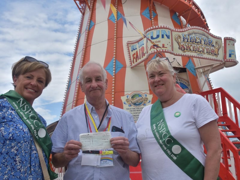 Tony Hogg of Ambassador Taxis presents a cheque for £1,000 to Sally Hobbins (left) and Anne Roberjot of the Skegness area branch of the NSPCC.