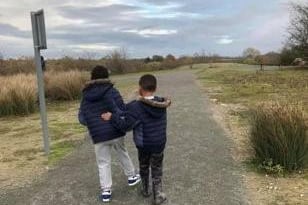 Olly, six, is pictured helping Jaden walk down a path. In his entry he said: “My big brother Jaden needs help with things and I like to help because I love him. His brain doesn’t work like mine, but he is clever in his own way”