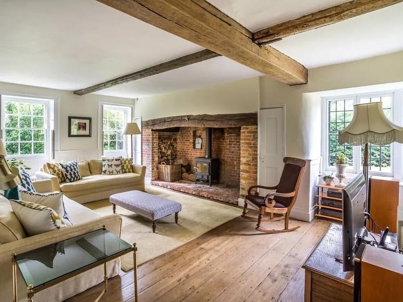 The drawing room and family room both have inglenook fireplaces.