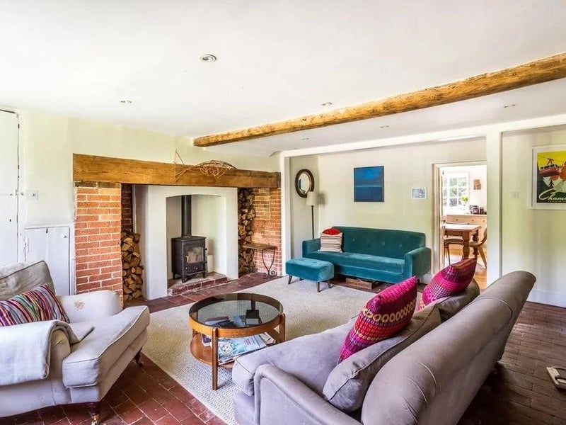 The drawing room and family room both have inglenook fireplaces.