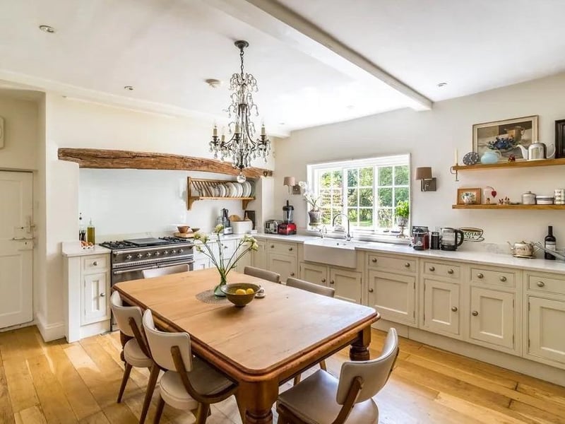 The modern kitchen is at the heart of the house and offers views over the rear gardens.