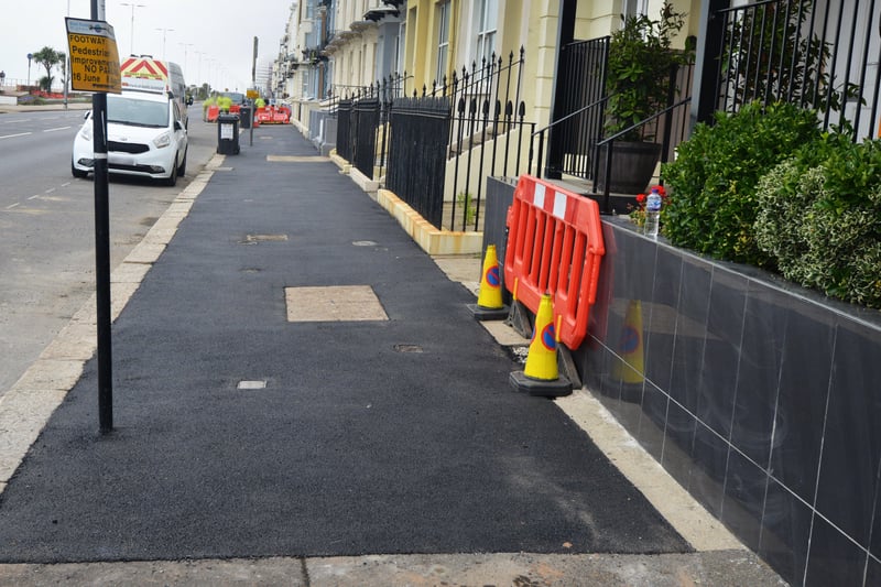 Tarmac has replaced paving slabs along Eversfield Place in St Leonards. SUS-210907-135409001