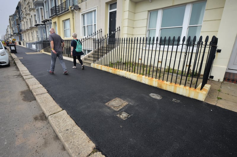 Tarmac has replaced paving slabs along Eversfield Place in St Leonards. SUS-210907-135422001