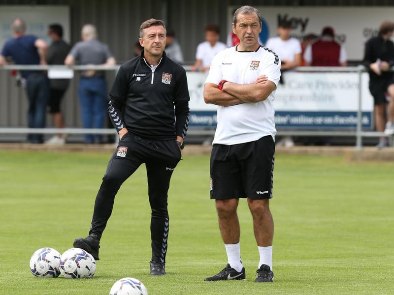 Jon Brady and new assistant Colin Calderwood watch over their players. Calderwood had been working his notice period at Blackpool up until the last few days.