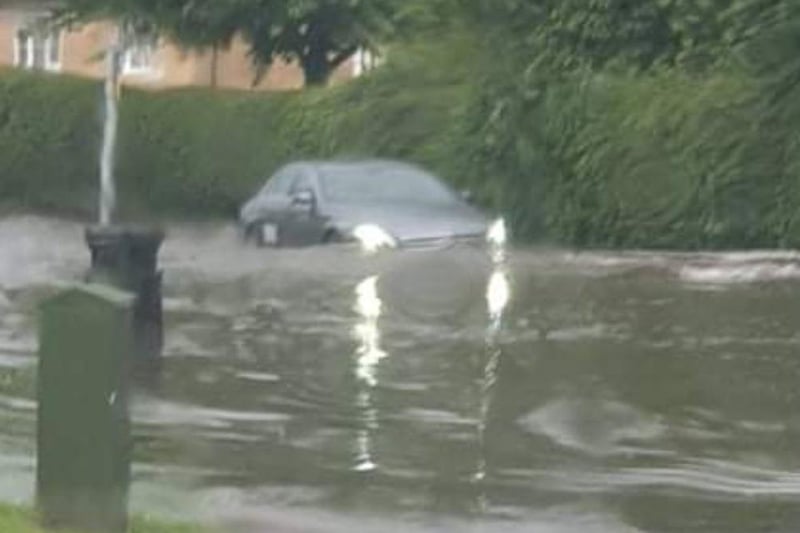 Another image from Helen Starr in Longthorpe taken as a car tries to negotiate deep flood water.