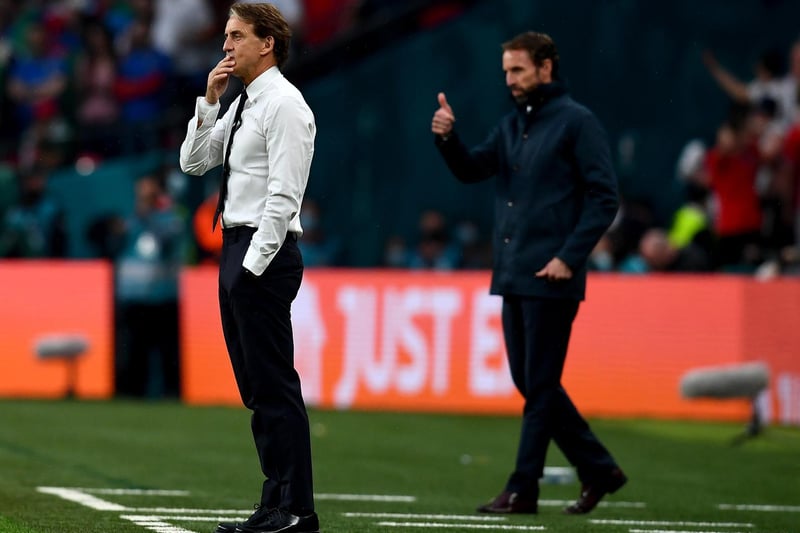 Southgate gives the thumbs up as Roberto Mancini watches on