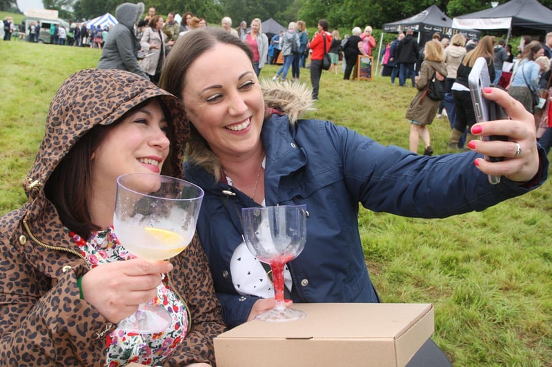 DM21070933a.jpg. Sussex Gin and Fizz Festival. Emma Smith, left and Ellie Malins. Photo by Derek Martin Photography. SUS-211007-204958008