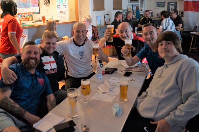 Smiles and cheers ahead of the Euro2020 final in Rasen's pubs EMN-211207-071146001