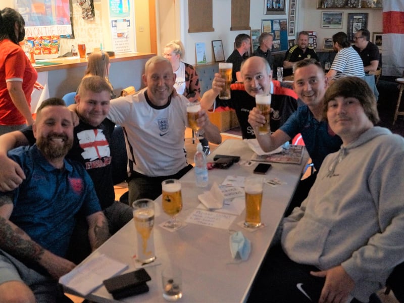Smiles and cheers ahead of the Euro2020 final in Rasen's pubs EMN-211207-071146001