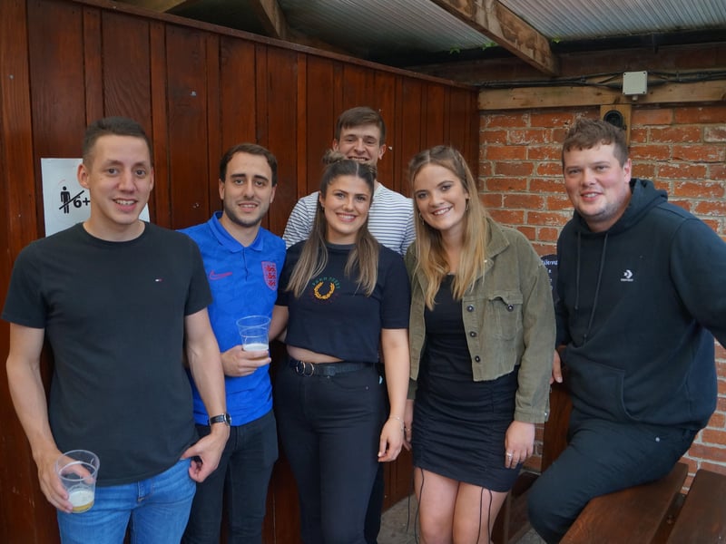 Smiles and cheers ahead of the Euro2020 final in Rasen's pubs EMN-211207-071244001