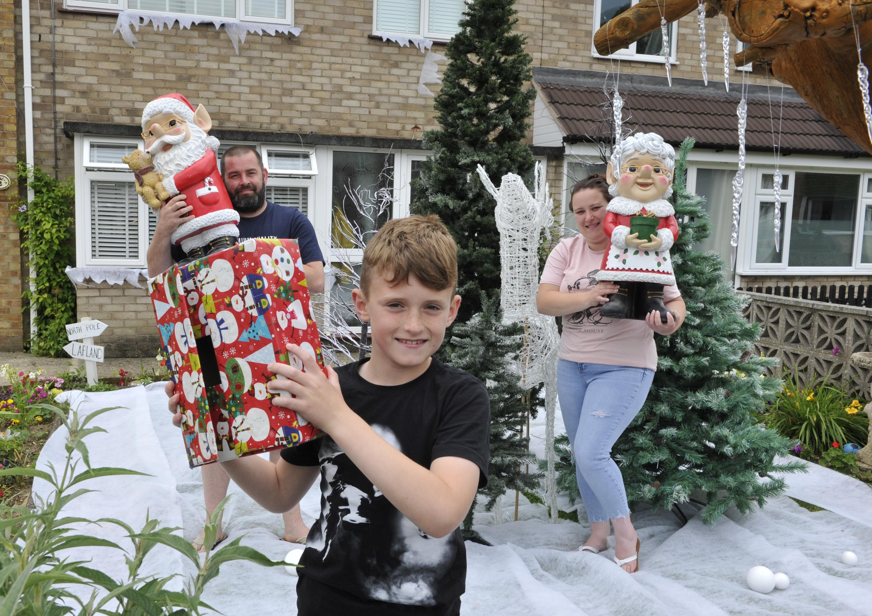 Charlie,  Darren and Amie Strotten with their Finland garden