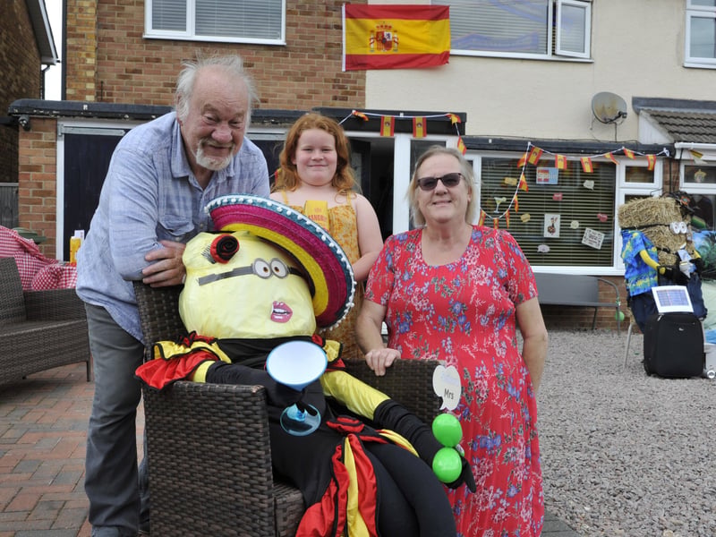 Brian and Julie Smith with their granddaughter and Spain