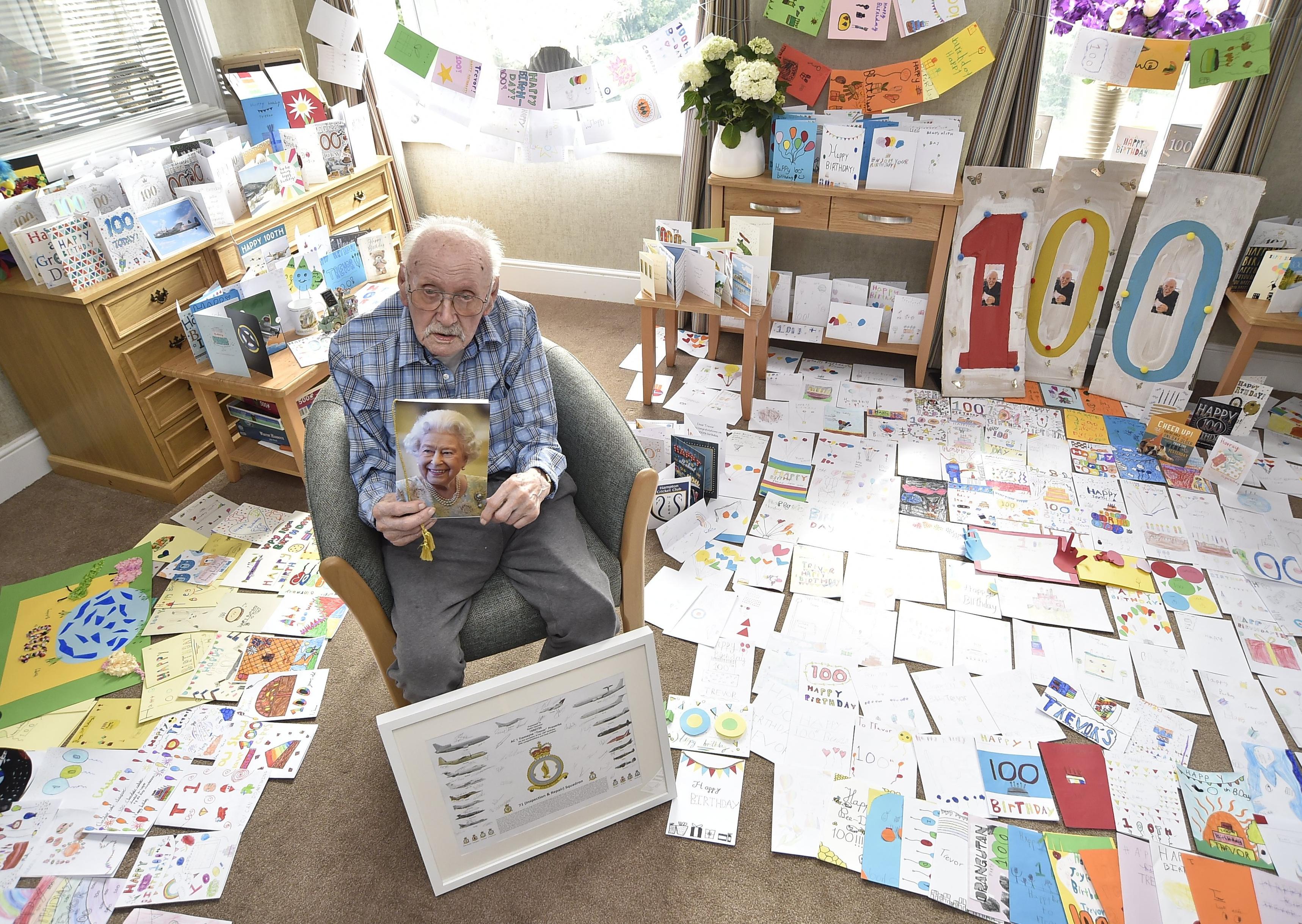 Trevor with his cards, holding his special card from the queen.