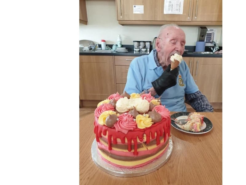 Trevor enjoys his cake.