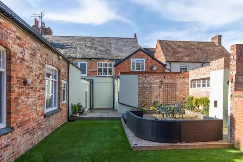 The courtyard and private garden that accompanies the home.