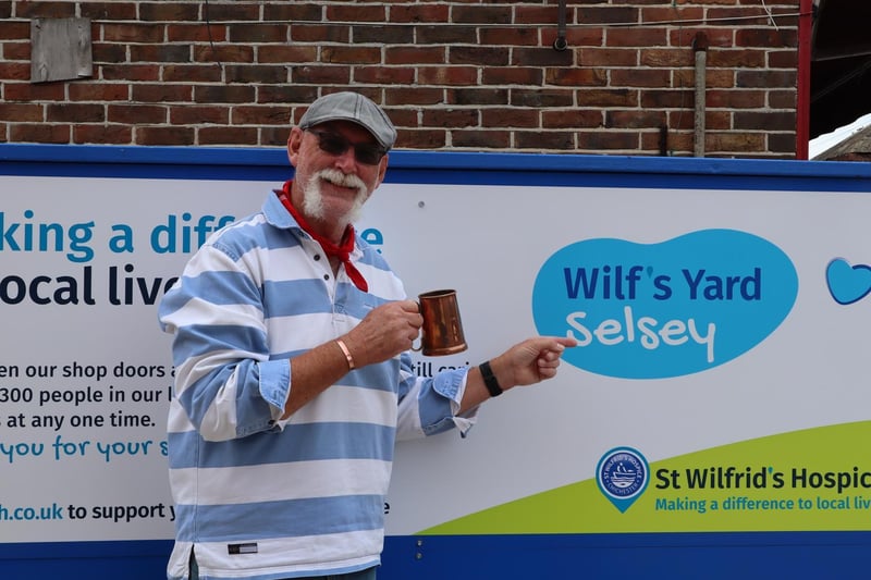 Mick of the Selsey Shantymen bags the first bargain of the day