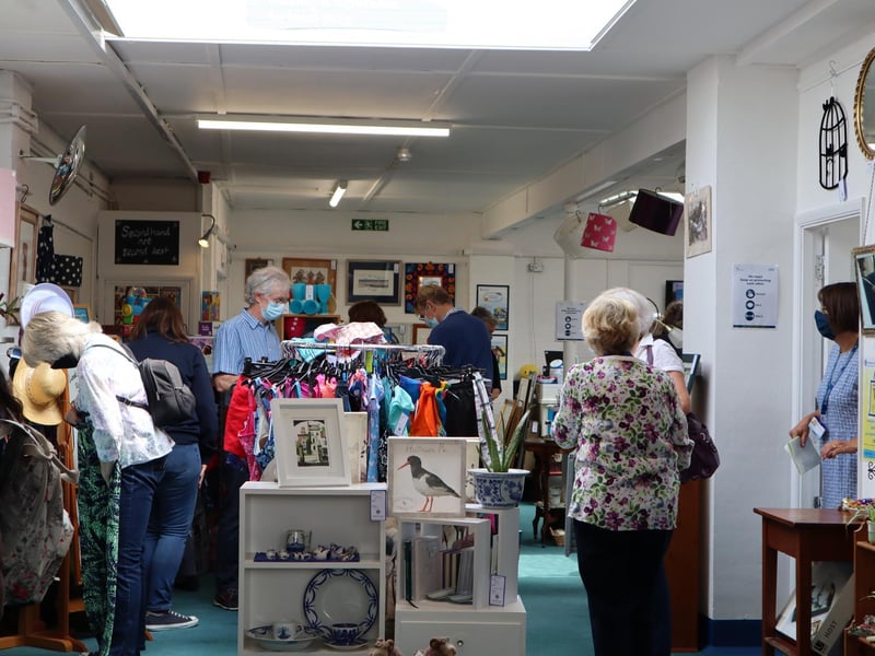 The Selsey Shantymen welcomed dozens of shoppers after the ribbon cutting