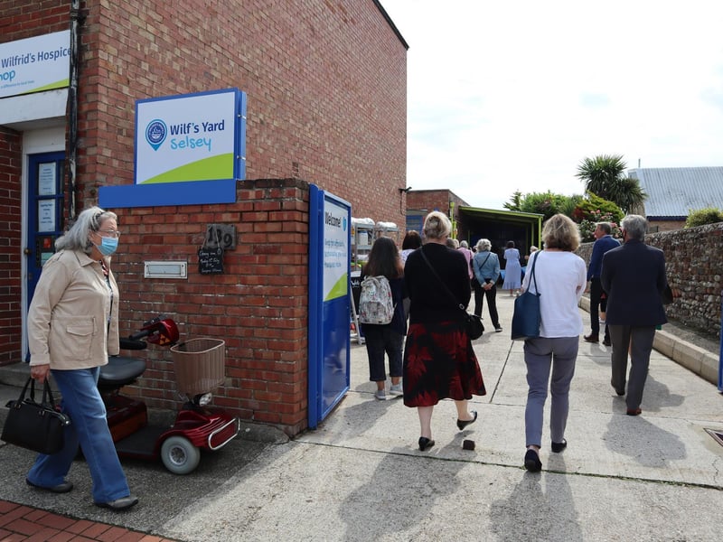 The Selsey Shantymen welcomed dozens of shoppers after the ribbon cutting