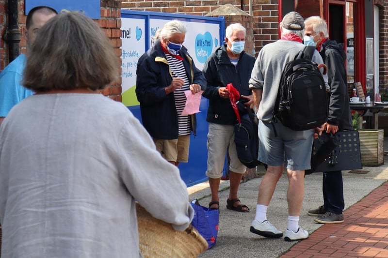 The Selsey Shantymen welcomed dozens of shoppers after the ribbon cutting