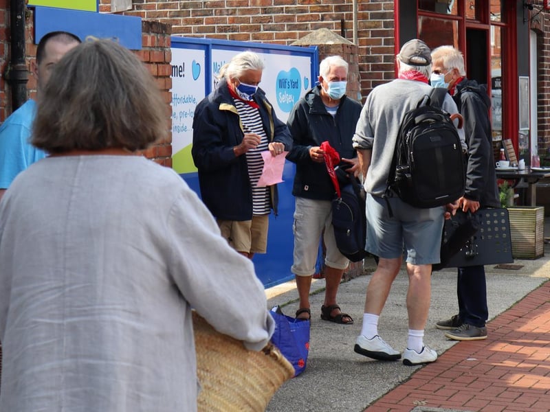 The Selsey Shantymen welcomed dozens of shoppers after the ribbon cutting