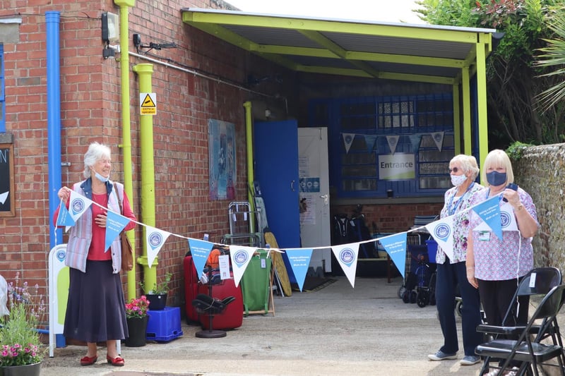The Selsey Shantymen welcomed dozens of shoppers after the ribbon cutting