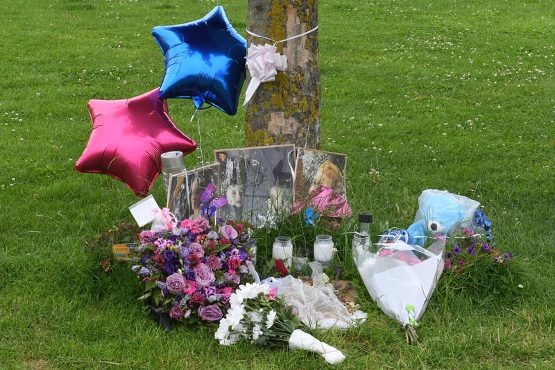 Floral tributes and balloons were left by DJ's tree on the Green. Purple was Bethany's favourite colour and blue represented DJ's love of Chelsea football team.