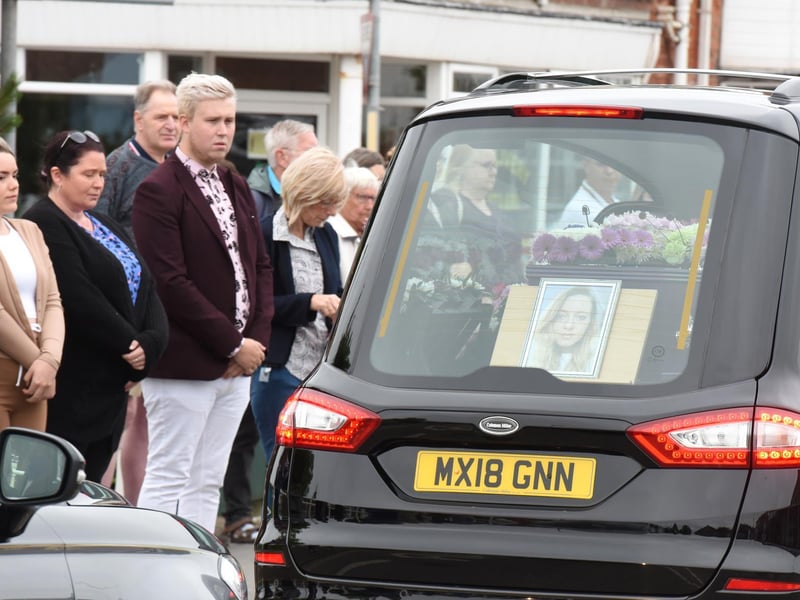 Friends line the streets to say their last farewells.