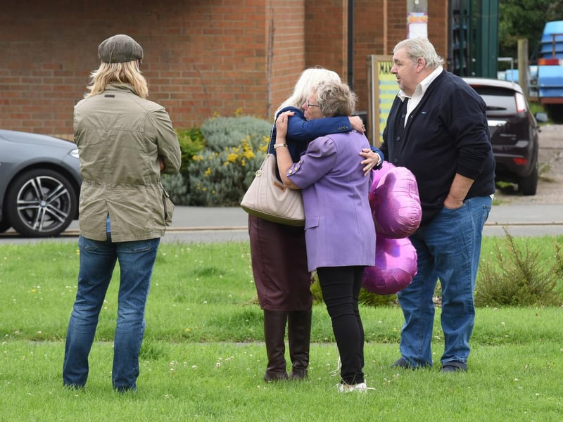 Members of the community paying their respects in Chapel St Leonards.