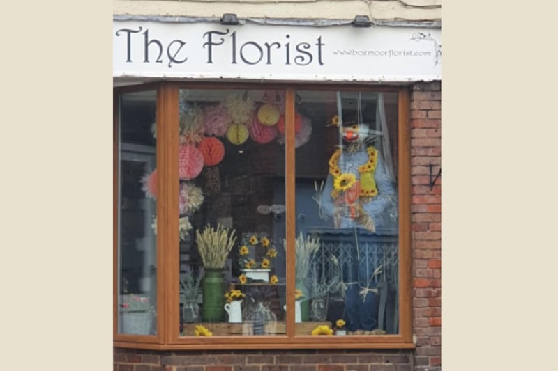 The Florist in Boxmoor has displayed a scarecrow in the shop window