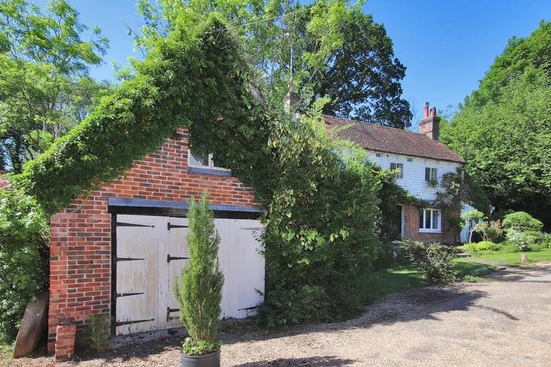Grade II listed detached cottage with separate barn, fishing lake, pasture and woodland