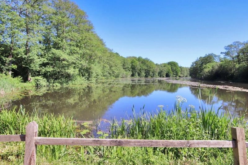 To the south of the house is a 4.3 acre portion of a fishing lake and boat house, currently let to Copthorne Fishing club who also pay an annual fee to use the parcel of land to the west of the cottage, which is used as a car park.
