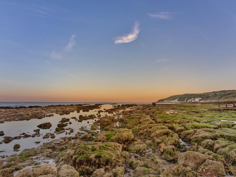 Eastbourne beach at sunset, at very low tide, with Beachy Head in the background. Taken by Barry Davis with a Canon EOS 5d. SUS-210716-111945001