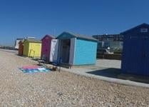 Beach huts, by Mandy Turner. SUS-210716-115835001