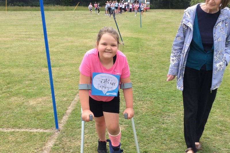 Alisha Baker completed a lap on crutches