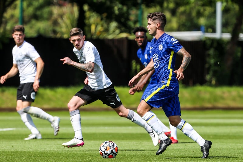 Kyle Barker in action with Christian Pulisic of Chelsea.
