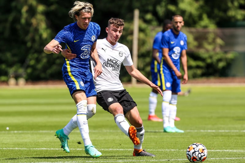 Harrison Burrows in action with Conor Gallagher of Chelsea.