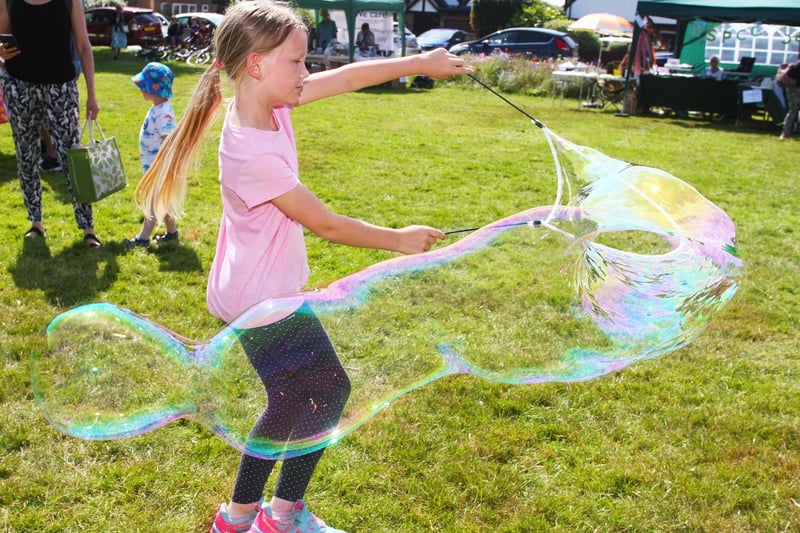 Fun with bubbles at the community fete