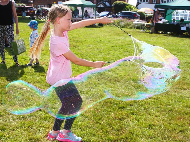 Fun with bubbles at the community fete
