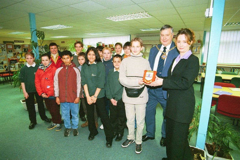 John Mansfield School , visit of french students and the Peterborough mayor Ray Pobgee;  holding plaque (left)  ludovic mori 13 - french student , Mayor Ray Pobgee , Sarah Watkins-Groves who was shadowing the mayor for the day , with John Mansfield pupils and French visitors behind.