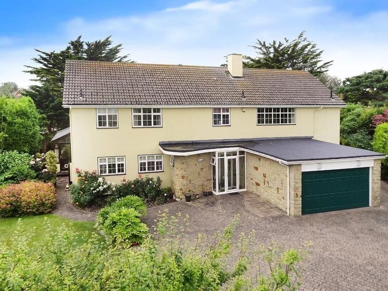 A large detached residence on a private estate – price on application.
