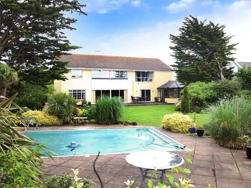 A large detached residence on a private estate – price on application.