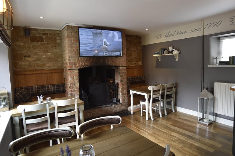 Interiors and exteriors of the White Swan pub in Woodnewton EMN-210629-193517009