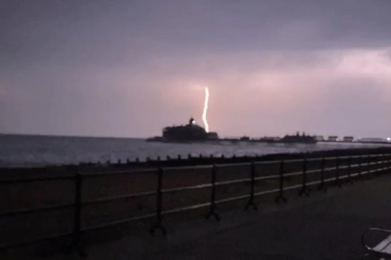 Lightning over Eastbourne Pier. Picture from Laura and Jazmine Parsons. SUS-210724-122804001