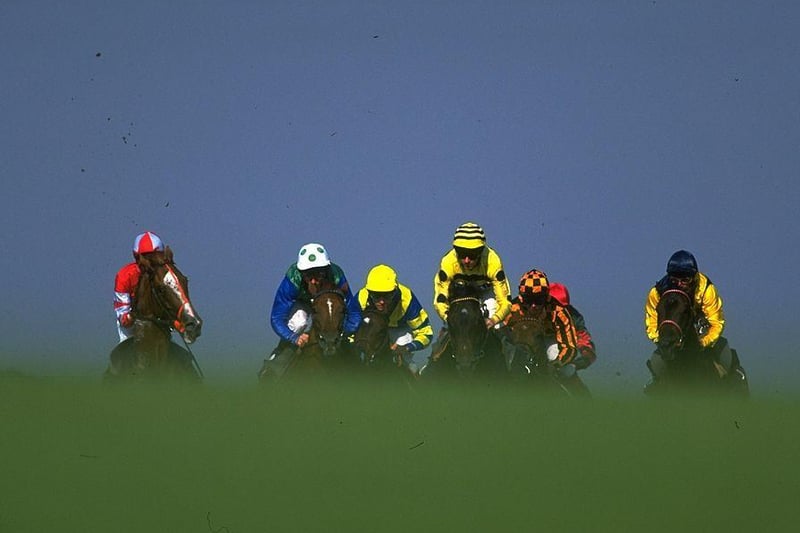 It's July 1995 in this view of horses and jockeys during a race at Glorious / Picture:  Mike Cooper/Allsport