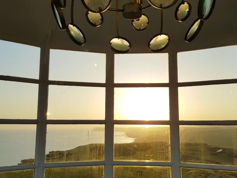 Sunset from Belle Tout lighthouse, Beachy Head, Eeastbourne, by Bob Newton. SUS-210726-113935001